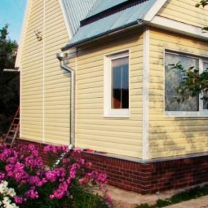 Обшивка дома сайдингом